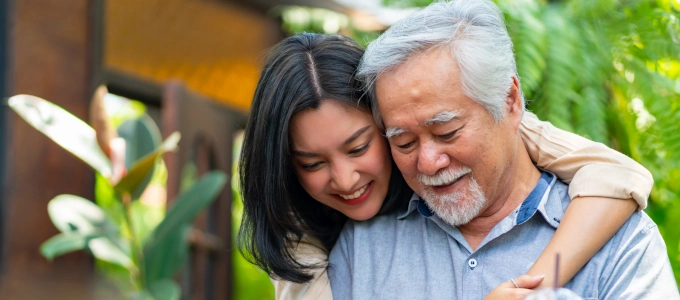 father and daughter happy senior is using check-in service father and daughter happy senior is using check-in service